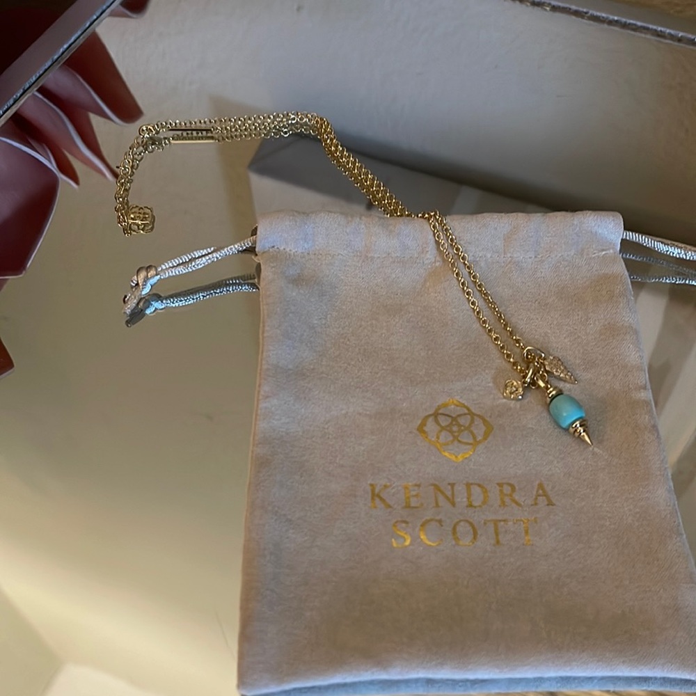 Gold with blue charm Kendra Scott necklace